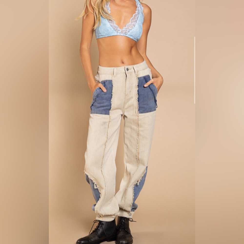 Light tan colored high waist denim with blue pocket detail by POL
